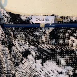 Beautiful black and white above knee dress